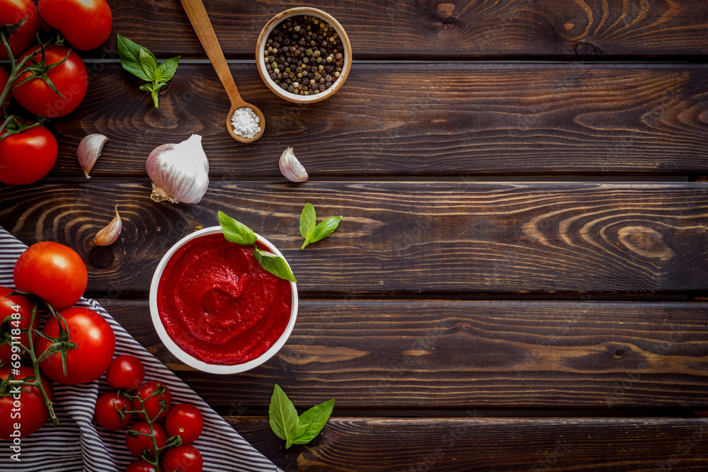 Italian tomato sauce for pasta - passata with tomatoes and basil Italian tomato sauce for pasta - passata with tomatoes and basil