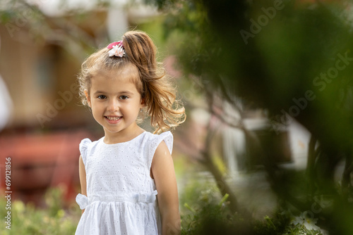 Cute little girl smiling, outdoor