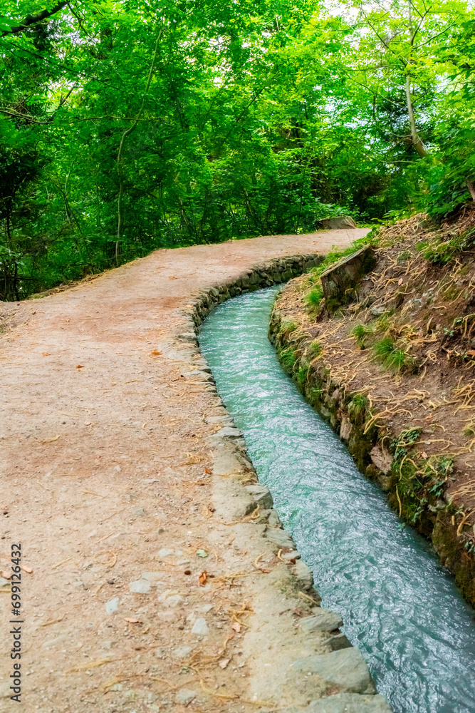 Hiking along the Marlinger Waalweg near Meran in South Tyrol Italy. With some Views over wineyards, the City of Meran, Marling and other Villages Hiking along the Marlinger Waalweg near Meran in South Tyrol Italy. With some Views over wineyards, the City of Meran, Marling and other Villages