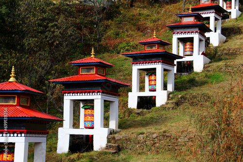 Water-powered prayer wheels in Thupten Choeling Monastery Nepal. photo