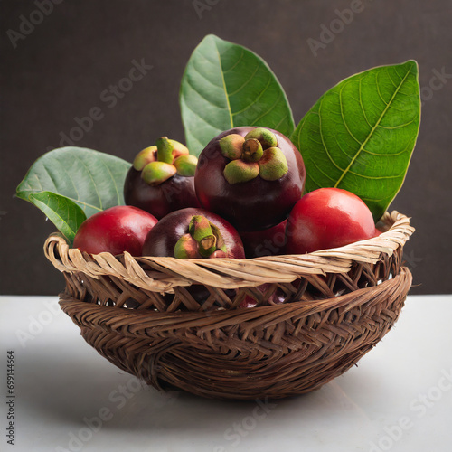 fresh kokum or garcinia indica fruit from india isolated over white or in cane basket with leaves. selective focus photo