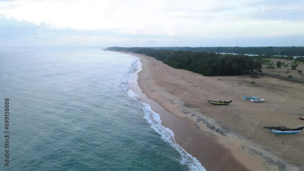 Aerial View of the Colorful Fishing Boats on the Baticaloa Beach, Sri Lanka. Aerial View of the Colorful Fishing Boats on the Baticaloa Beach, Sri Lanka.