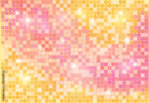 Abstract rectangular background made of round pink, peach and yellow sequins