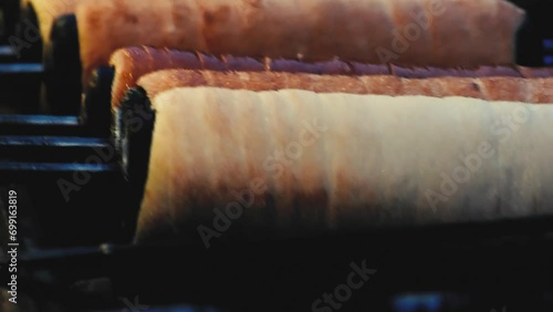 Zooming and panning on Chimney Cakes at a fair quick shot footage 4k photo