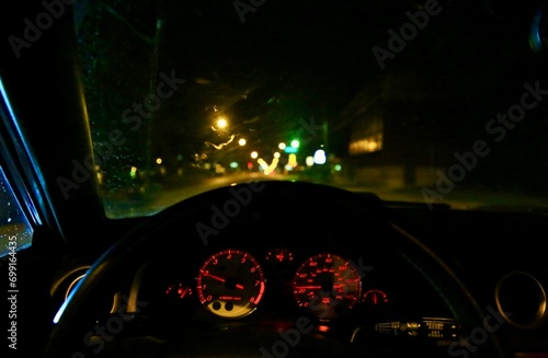 Driving on a dark roadway in an automobile 