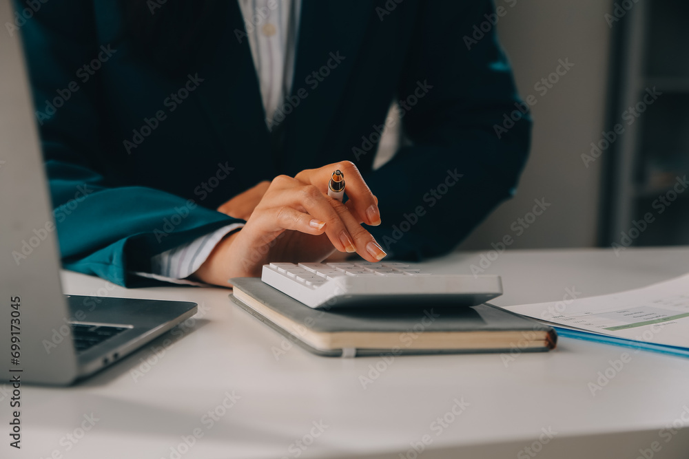 Thinking about how to take the business to technological heights. Cropped shot of an attractive young businesswoman working in her office. Thinking about how to take the business to technological heights. Cropped shot of an attractive young businesswoman working in her office.