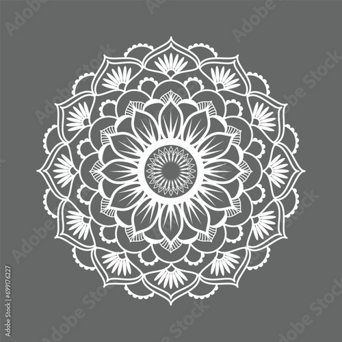 Free vector white mandala on black background.