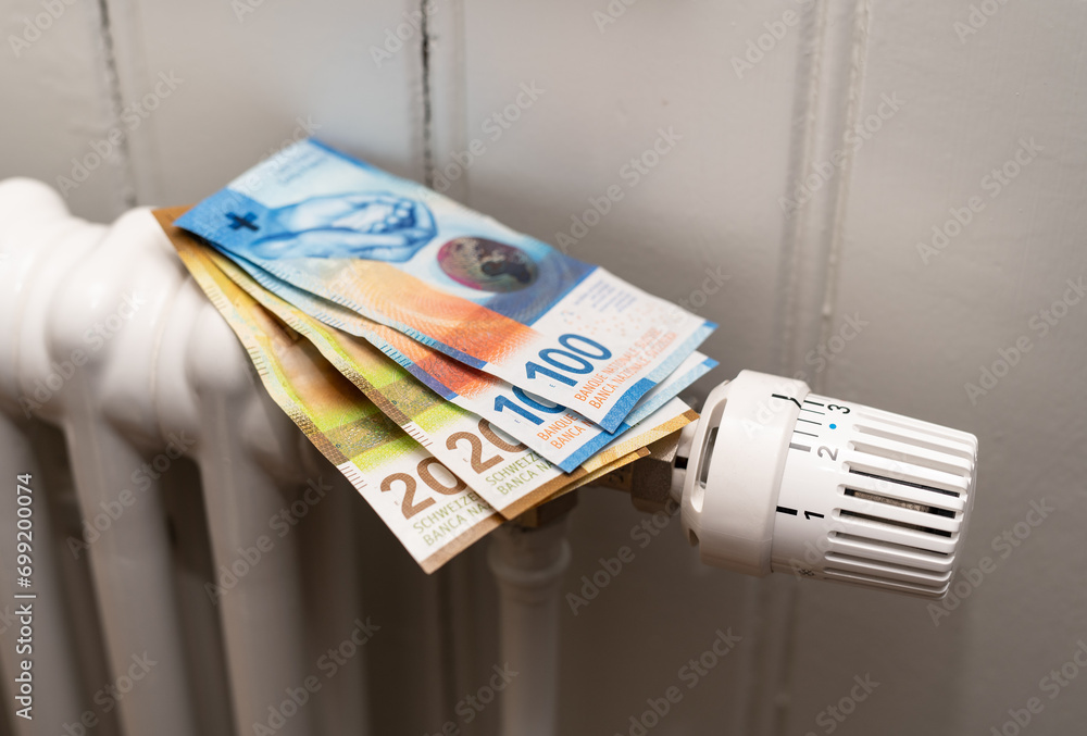 Heizung mit Geldscheinen Schweizer Franken Energiepreise, Heizkosten