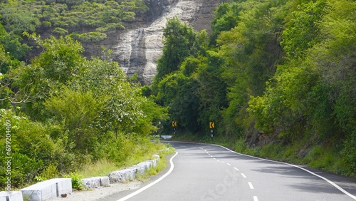 Beautiful scenic road to kodaikanal hills. Surrounded by lush Green Mountain rocks. photo