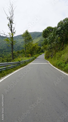 Beautiful scenic road to kodaikanal hills. Surrounded by lush Green Mountain rocks.
