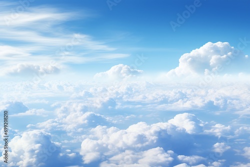 "Morning aerial view of vast sky with billowy clouds."