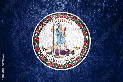Banner of the grunge Virginia state flag. Dirty Virginia state flag on a metal surface.