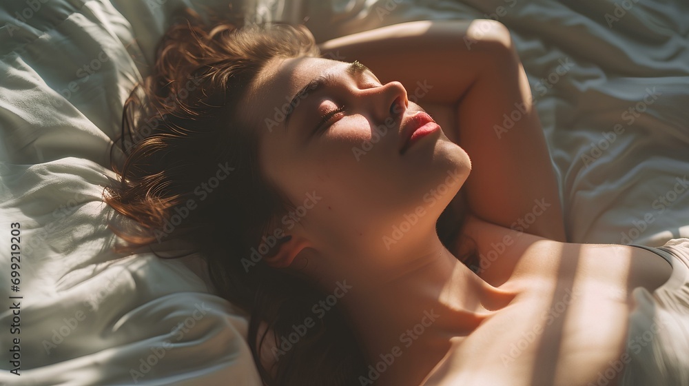 Obraz premium A beautiful woman who oversleep on the morning of the weekend in bed. generative AI