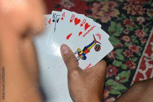 Playing card games, a gambling game played by some people
