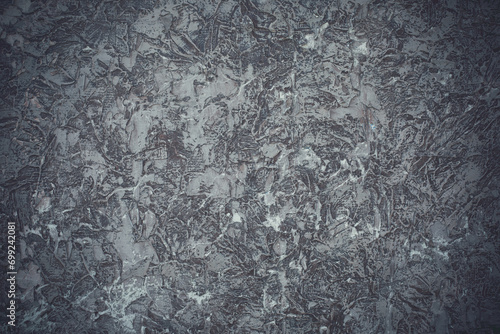 Surface of an old shabby gray wall