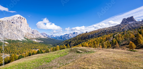 Panorama of golden larch forests and dolomite mountains near Cortina d´Ampezzo, Italy