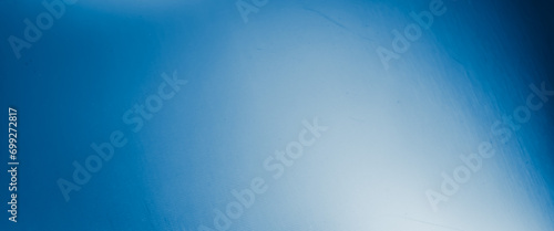scratched blue metal sheet with visible texture. background photo