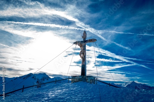 Gipfelkreuz mit Jesus am Stubnerkogel Bad Gastein Österreich photo