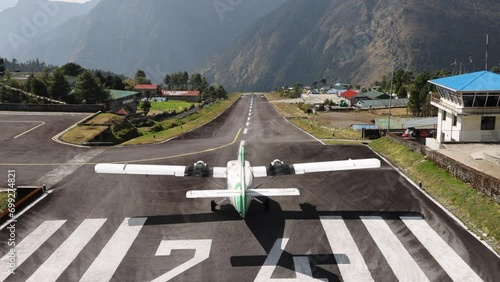 Small plane departing from one of the most dangerous airport, Lukla. Nepal photo