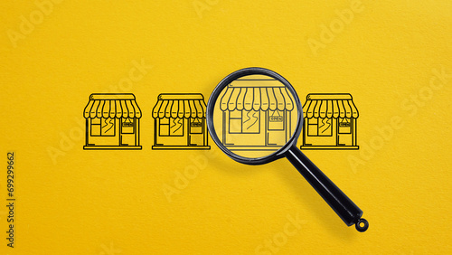 Franchise business, magnifying glass chooses franchise marketing icons Store photo