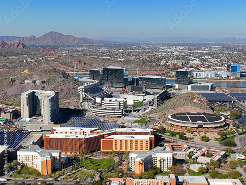 Arizona State University ASU including Mountain America Stadium and Desert Financial Arena in main campus aerial view in city of Tempe, Arizona AZ, USA.  photo