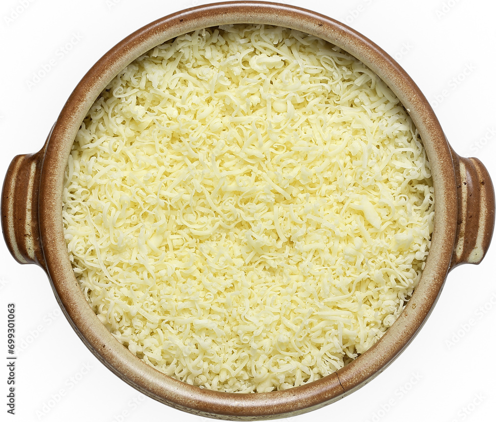grated cheese in clay bowl isolated grated cheese in clay bowl isolated