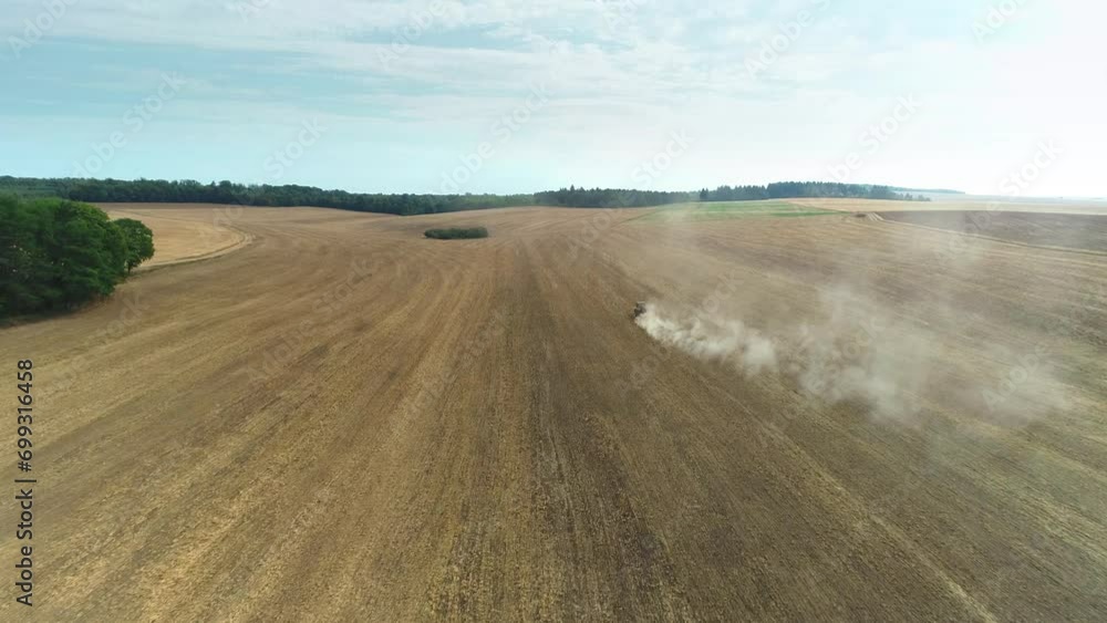 Flying Through Dust Trail Left by Tractor in Dry Field - Haute Marne, France 4K Drone Footage
Flying Through Dust Trail Left by Tractor in Dry Field - Haute Marne, France 4K Drone Footage