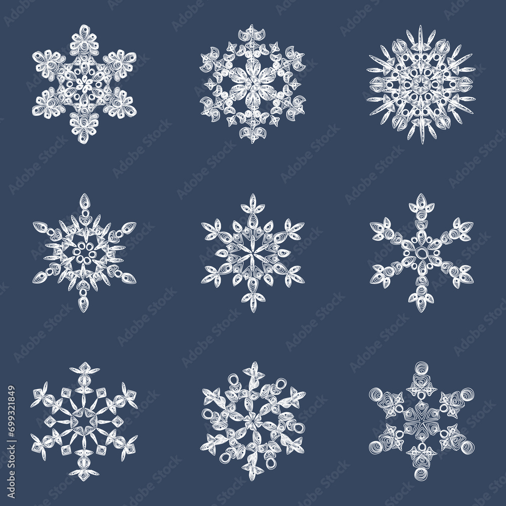 A set of stylish white quilling snowflakes on a dark blue background. Paper openwork weaving technique. Elements of quilling. New Year's symbols A set of stylish white quilling snowflakes on a dark blue background. Paper openwork weaving technique. Elements of quilling. New Year's symbols