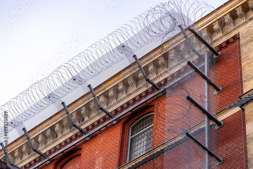 Photography Gefängnis Berlin Moabit mit Stacheldraht und Gitterfenstern