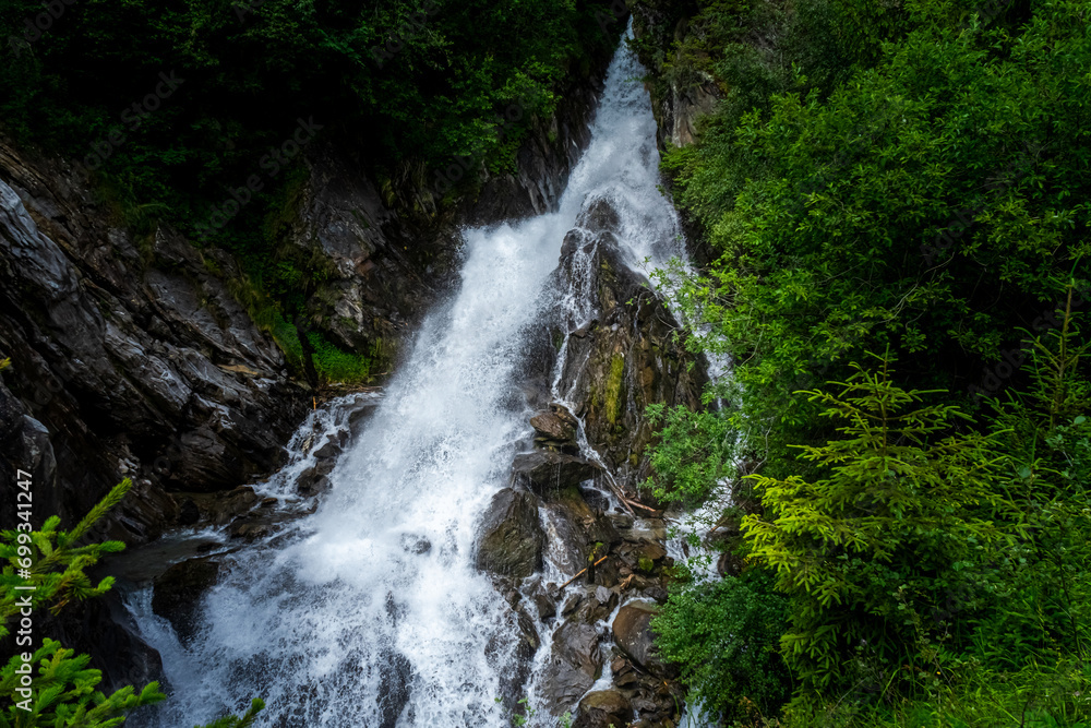 Hiking to the Parcines Waterfalls near Meran in South Tyrol Italy. 