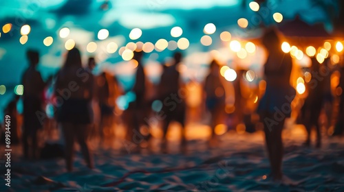 Lively night beach party in summer with blurred background. Dynamic and energetic atmosphere of the holiday