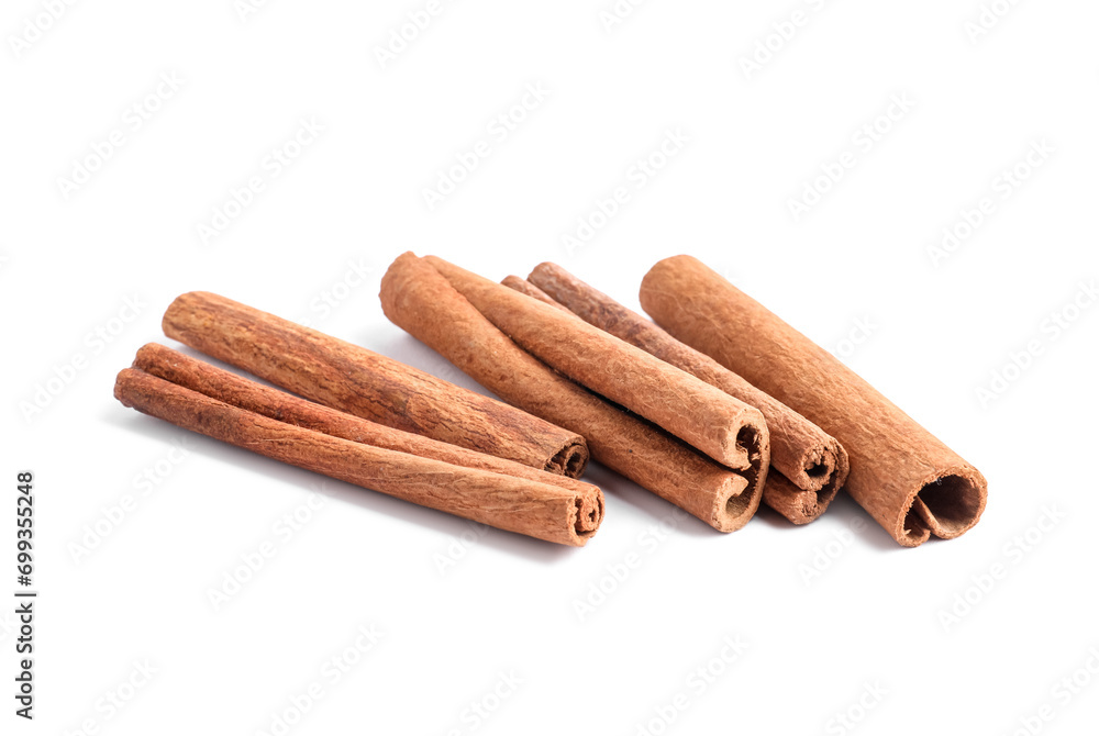 Dry aromatic cinnamon sticks isolated on white