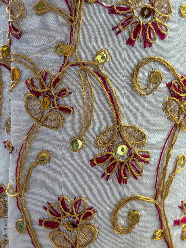 Close-up of multi-colored scarves , dupatta stola chunri , stola showing fabric and patterns used by ladies in clothing photo