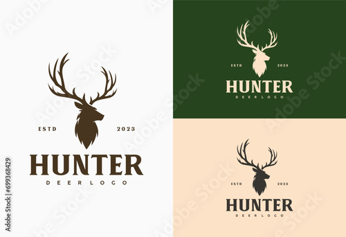 Classic Vintage Antlers Deer Face for Wildlife Hunting Logo Design. photo