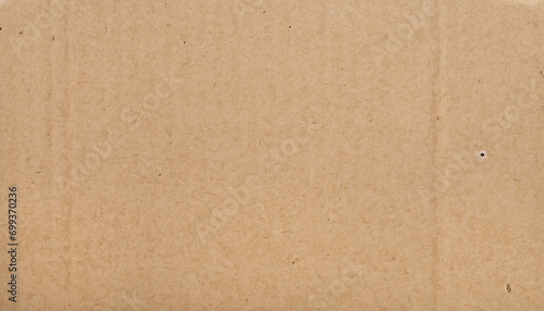 Brown cardboard sheet paper for design background photo