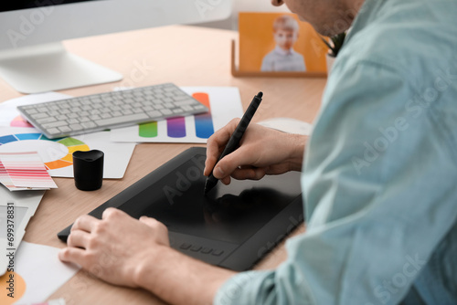 Male designer using graphic...