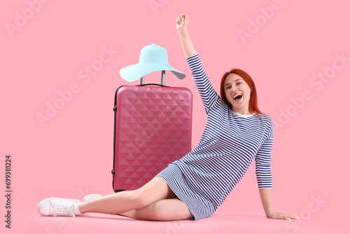 Happy female tourist with s...