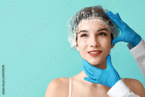 Young woman with marked fac...
