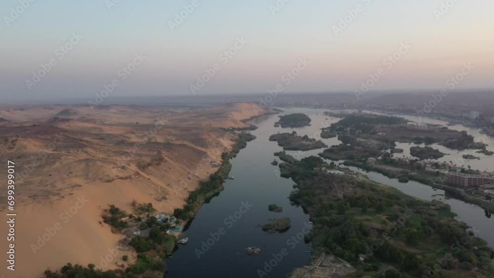 Scenic Aerial Drone shot of Nile River and West Bank and Desert in Aswan, Egypt Scenic Aerial Drone shot of Nile River and West Bank and Desert in Aswan, Egypt
