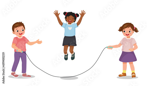 Cute kids children boy and girl playing jumping rope
