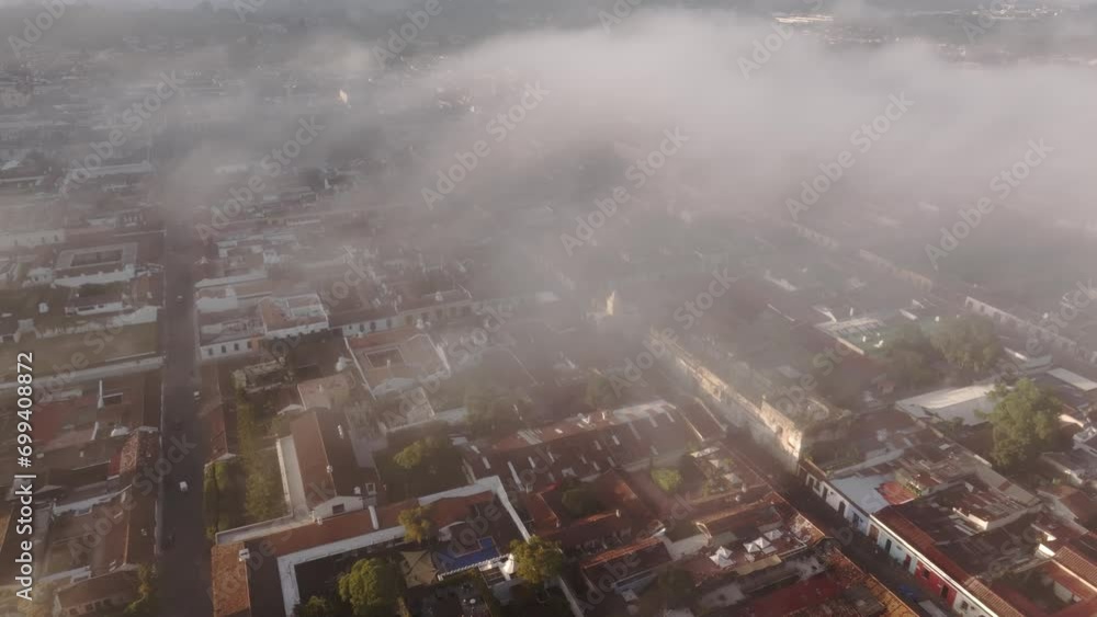 Aerial view of Santa Catalina arch in Antigua city Guatemala foggy sunrise Aerial view of Santa Catalina arch in Antigua city Guatemala foggy sunrise