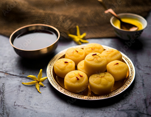 kesar pedha or peda is an indian traditional sweet dish made from milk khoya and saffron photo