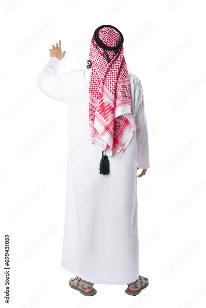 Back view of an Arab man in thobe standing on white isolated background Back view of an Arab man in thobe standing on white isolated background