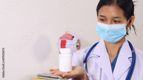 Initial AI illustration of a close-up of a female doctor's hand signing a medical document on a clipboard. and recommending certain medicines to patients on a laptop © Worapon