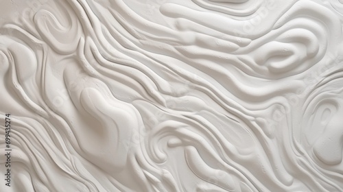Flowing and densely textured white creamy foam background.