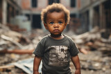 African toddler baby in dirty jacket looking at ruins of bombed destroyed house building due to war conflict area. Effect from war humanity mankind loss and waste big loss concept