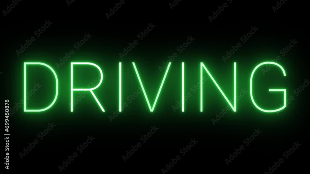 Flickering neon green glowing driving text animated on black background Flickering neon green glowing driving text animated on black background