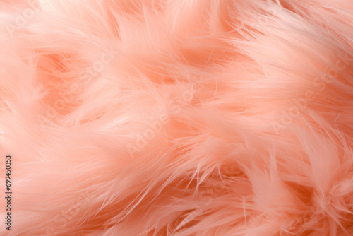 Peach colored fur close-up, fashionable trendy texture.Color of the year 2024 - Peach Fuzz. © syhin_stas