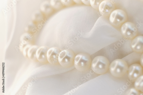 Pearls softly resting on a white background exhibit a calm, undisturbed elegance. This imagery is a comforting break from the high-energy, over-saturated visuals of modern digital trends.