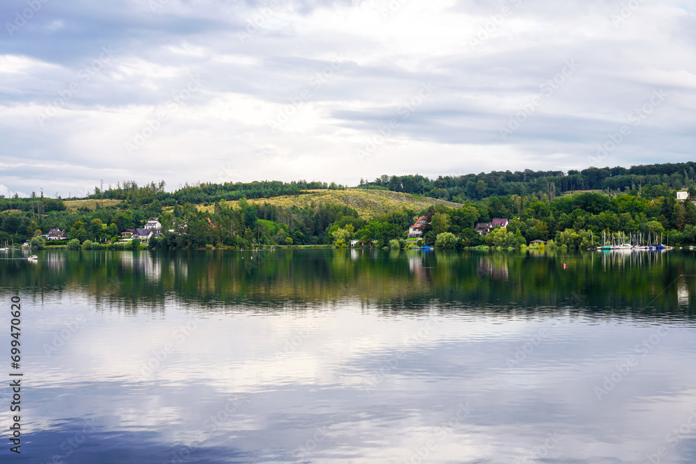 View of the Möhnesee and the surrounding landscape in the evening. Nature near Körbecke. View of the Möhnesee and the surrounding landscape in the evening. Nature near Körbecke.
